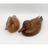 A vintage carved ash decoy duck titled 'Teal Drake' by Archie Thomson together with another