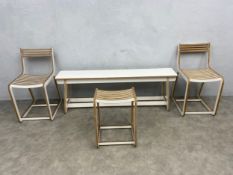 A pair of contemporary bent oak plywood dining chairs together with the matching stool and bench