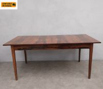 A mid-century Santos rosewood extending dining table by Robert Heritage for Archie Shine having a