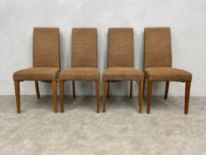 A set of four contemporary high back dining chairs upholstered in calico. H.99cm.