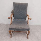 A 19th century beech framed William and Mary style armchair. (In need of re-upholstery).