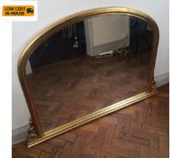 A 19th century style overmantel mirror in arched gilt frame. 140x96cm. (Cresting missing as seen).