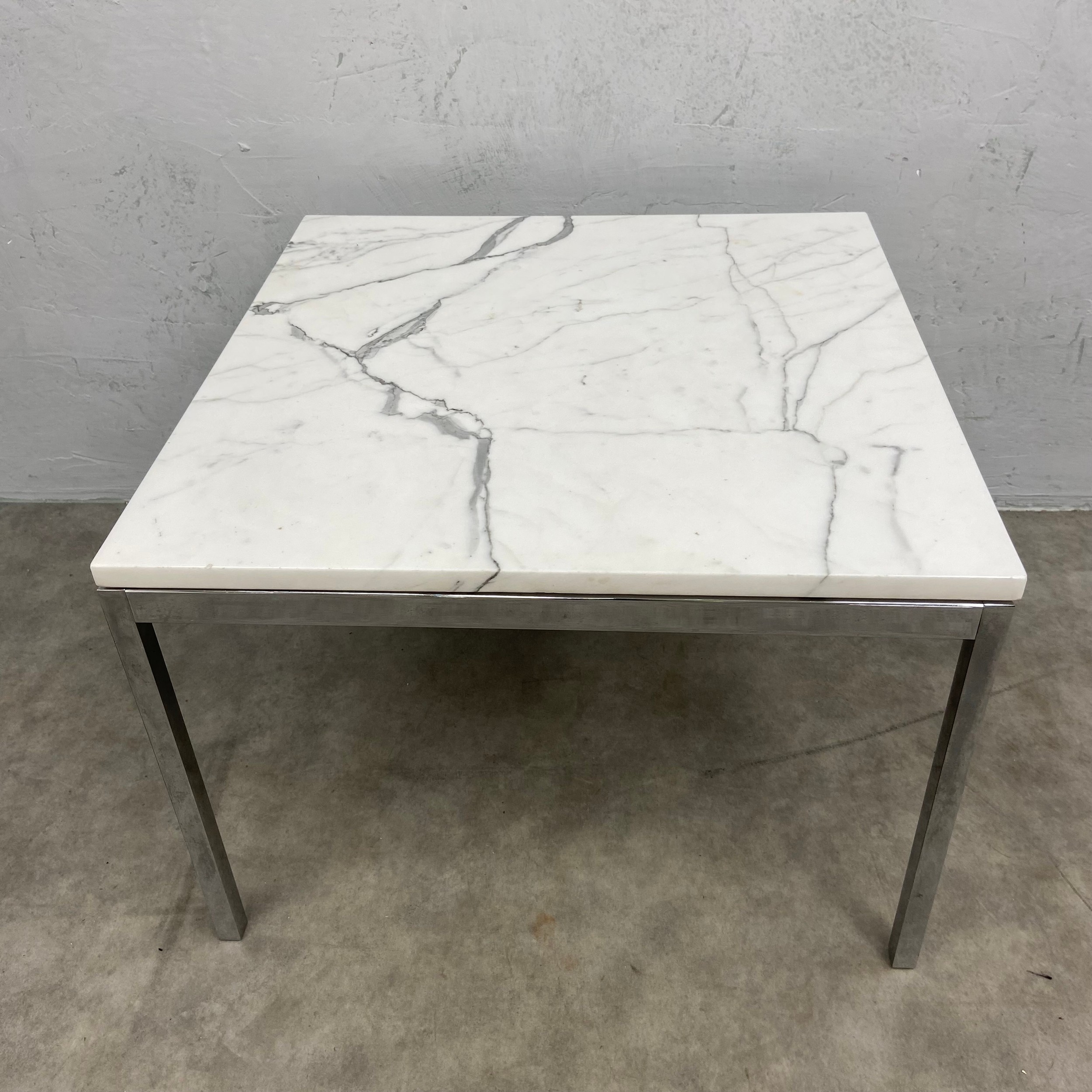 A mid to late 20th century low side or coffee table in the style of Florence Knoll with white marble - Image 2 of 3