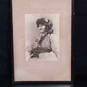 A vintage printed portrait of a tribesman in traditional dress, signed Jagger in plate to the bottom