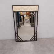 A contemporary Art Deco style wall mirror with Neoclassical composite swag moulded frieze over the