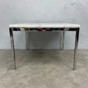 A mid to late 20th century low side or coffee table in the style of Florence Knoll with white marble