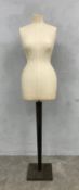 A 20th century haberdashers or dressmakers' adult mannequin with cotton torso raised on a tapered