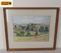 A mid century watercolour, indistinctly signed, titled to the reverse, A Sussex Village. 64x55cm.