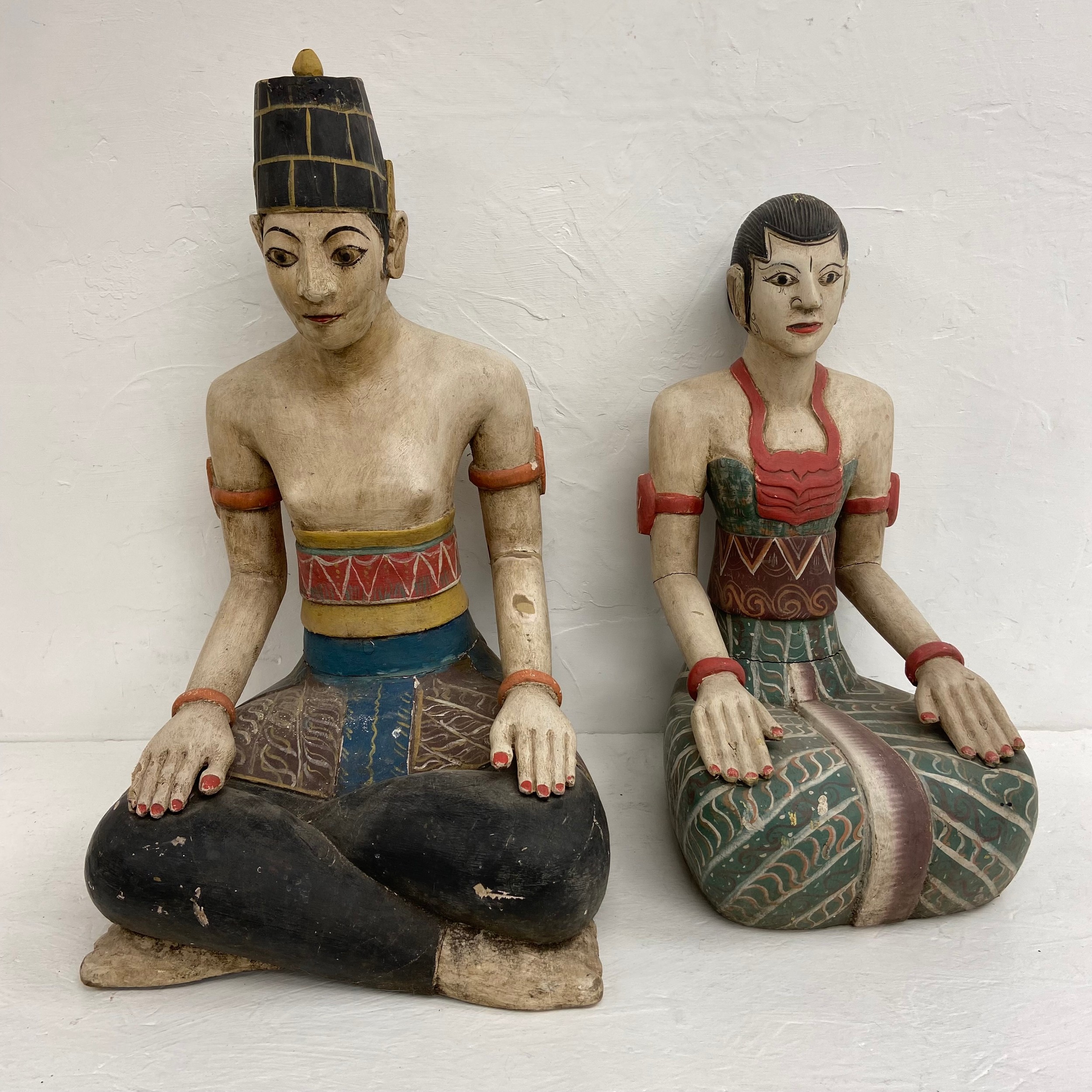 A pair of 20th century hand carved and painted Javanese matrimonial Loro Blonyo or inseparable