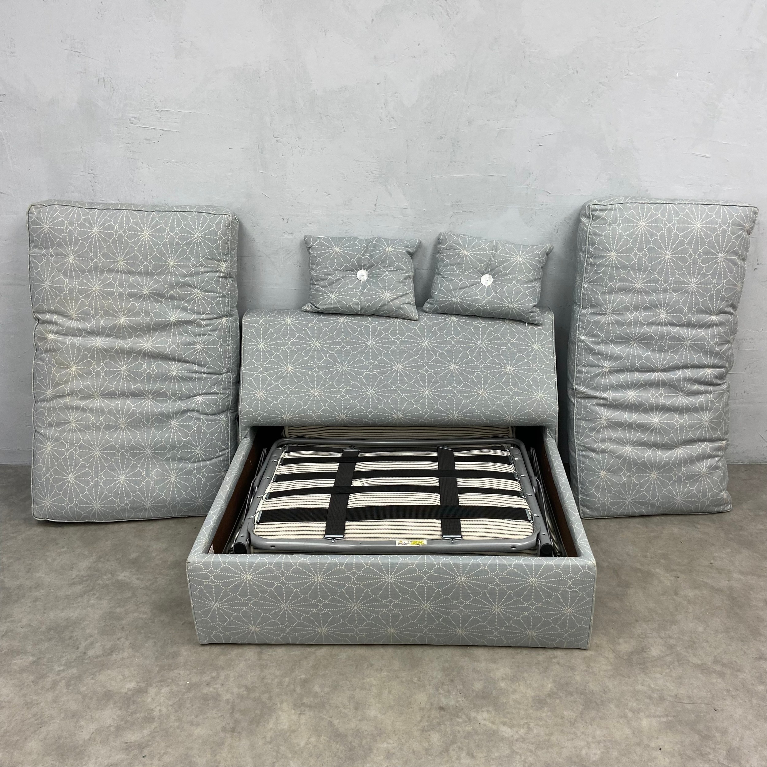 A contemporary single sofa bed with pale blue patterned upholstery. H.85 W.103 D.92cm. Mattress. L. - Image 3 of 5