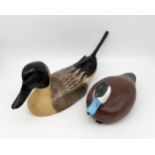 A contemporary hand carved and painted decoy duck titled 'Pintail Drake' by Karen McKnight