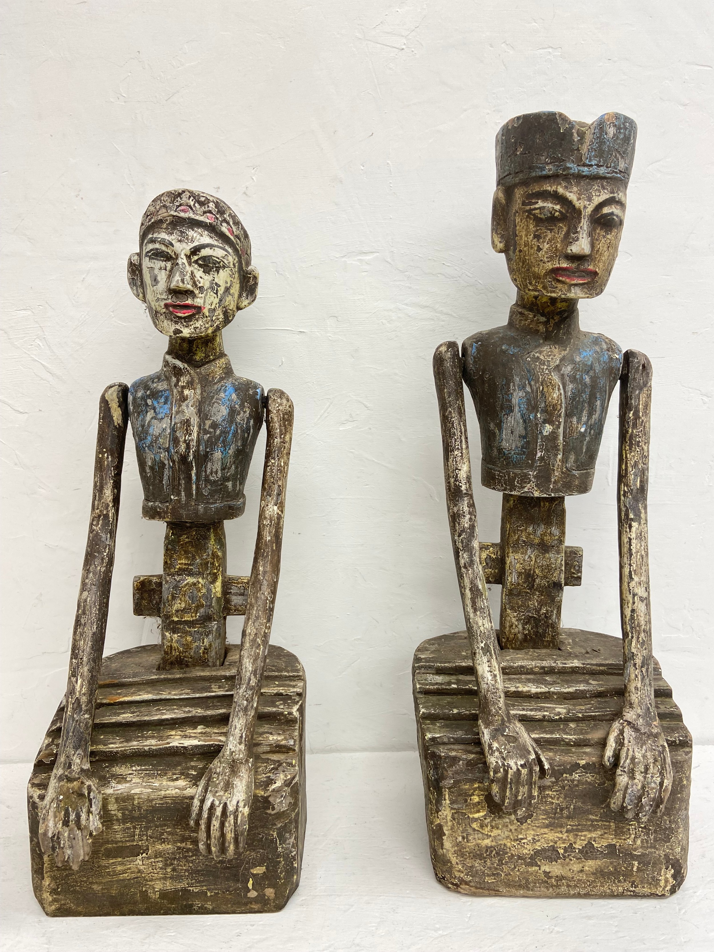 A pair of 20th century hand carved and painted Javanese matrimonial Loro Blonyo or inseparable