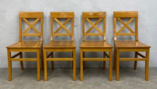 A set of four vintage oak cross-back dining chairs. Seat height 48cm