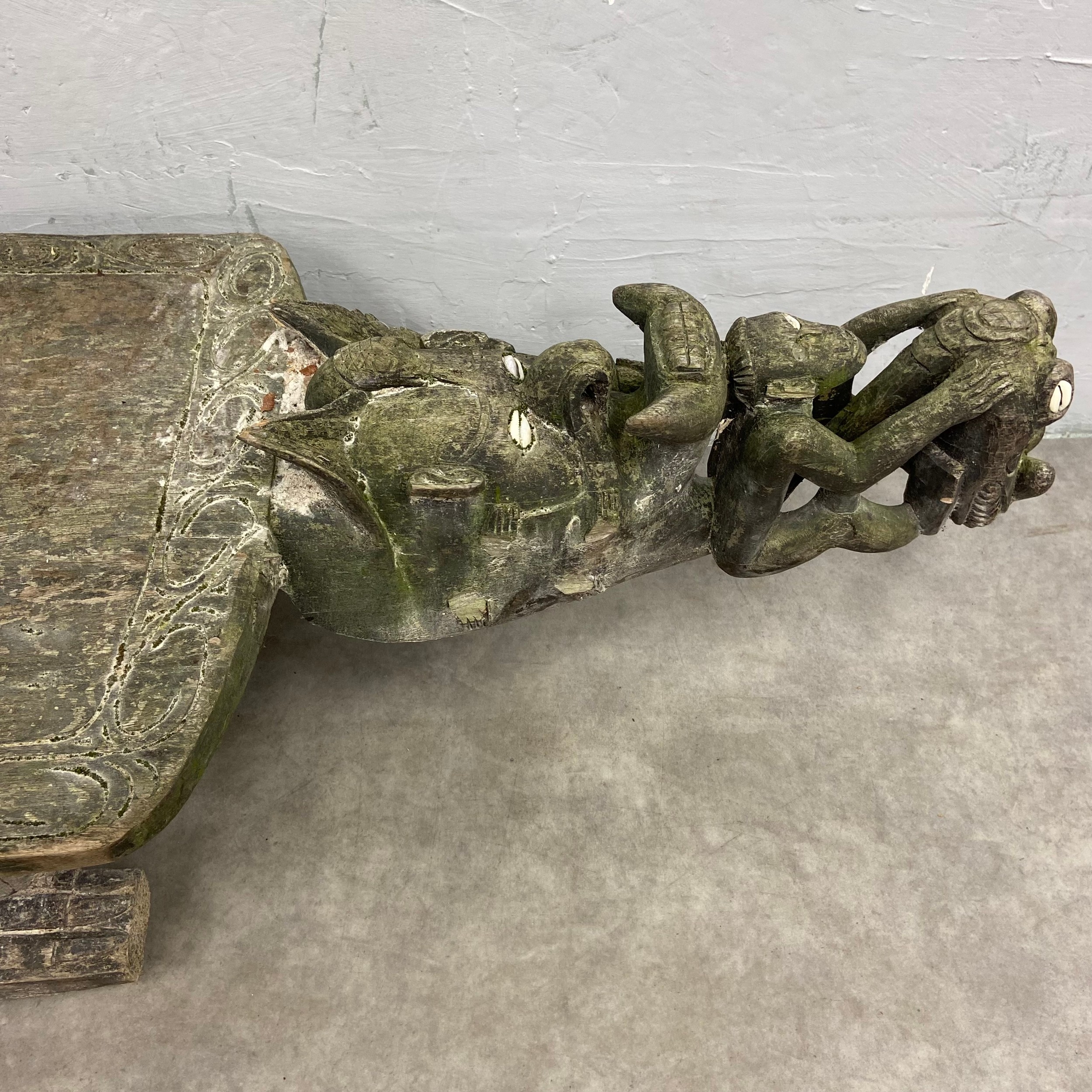 A 20th century African tribal hardwood ceremonial bench of abstract figural form with carved - Image 3 of 7