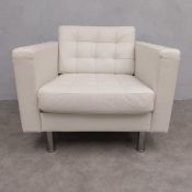 An IKEA retro styled salon armchair in faux leather. H.64 W.88 D.88cm