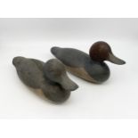A pair of vintage hand carved and painted decoy ducks. L.35cm each