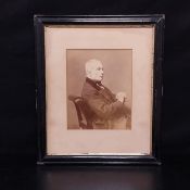 A late 19th century photographic portrait if a gentleman. Framed and glazed with a indistinct