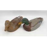 Two vintage hand carved and painted wood decoy ducks titled 'Mallard drake' and 'Mallard' 1989 by