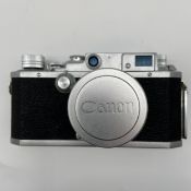 A 1950s vintage Japanese metal cased bottom-loading Canon Camera Co. Inc. series IV SB Rangefinder