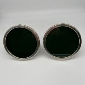 A pair of 1970s 925 sterling silver hallmarked picture frames by Sanders & Mackenzie. Diam.16cm.