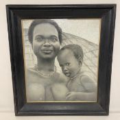 A contemporary charcoal portrait of a mother and child, signed D. Charlaff bottom right in painted