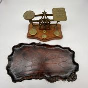 A C.1900 Japanese carved boxwood lotus leaf tray together with a set of early 20th century brass and