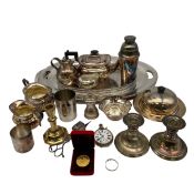 A large mixed collection of silver plated and other metal items to include an M. M. & Co. goliath