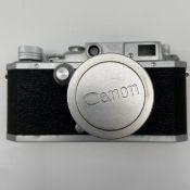 A 1950s vintage Japanese metal cased bottom-loading Canon Camera Co. Inc. series IV SB Rangefinder
