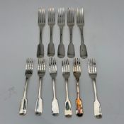 A set of eleven early 19th century Georgian hallmarked 925 sterling silver fiddle pattern dining and