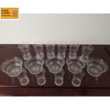 A set of early 20th century etched glass tumblers and finger bowls. H.12 (Tallest).