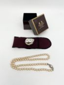 A vintage Penhaligon's 800 silver egg box with gilt interior together with an antique pearl necklace