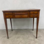 A 19th century French poudreuse style kingwood vanity dressing table with profuse satinwood