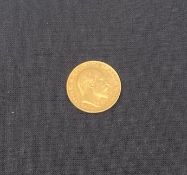 A 22ct King Edward VII gold sovereign coin, London, 1904. 8g