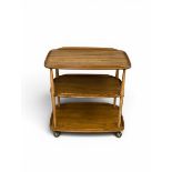 A vintage Ercol three tiered beech and elm tea trolley. H.75 W.73 D.47cm