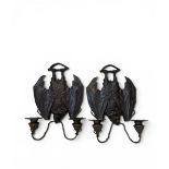 A pair of contemporary Art Nouveau style cast and bronzed metal bat wall sconce candelabras. H.33.5