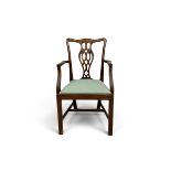 A mahogany Chippendale style armchair. H.91 H. seat 45 W.54.5 D.54.5cm