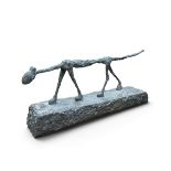 After Giacometti, Le Chat, a patinated metal cat figure on plinth base. H.16cm x W.42cm
