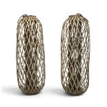 A large pair of contemporary wicker hurricane lanterns, glass inserts with handles. Pair H.119 x W.