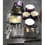 A Pearl "Forum Series" drum kit consisting of 5 drums, 2 symbols, all stands & supports., stool,