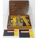 A wooden cased box of vintage Meccano, 48cm x 6cm. ***Delivery Not Available for this Lot***