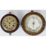 A late Victorian Negretti & Zambra mahogany cased wall clock and an oak cased aneroid barometer,