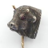 Victorian silver and gold bull's head stick pin in a fitted case, 15 grams, 17.8mm wide.