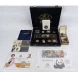 Various British coins, some coin covers, D-Day tribute crown and other commemorative coins.
