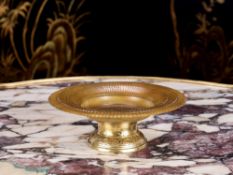 AN INDO - PERSIAN CARVED HORN AND BRASS TAZZA