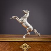 AN ITALIAN SILVER MODEL OF A REARING STALLION