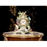 MEISSEN: A PORCELAIN FLOWER ENCRUSTED ORNITHOLOGICAL MANTEL CLOCK