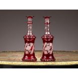 A PAIR OF 19TH CENTURY BOHEMIAN FLASHED AND ETCHED RUBY GLASS DECANTERS