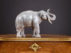 A ROYAL COPENHAGEN PORCELAIN MODEL OF AN ELEPHANT