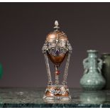 A SILVER, ENAMEL AND JEWELLED MUSICAL PENDULE A CERCLES TOURNANTS CLOCK