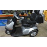 An Afkim TGS three wheeled scooter, with charger and key - not checked
